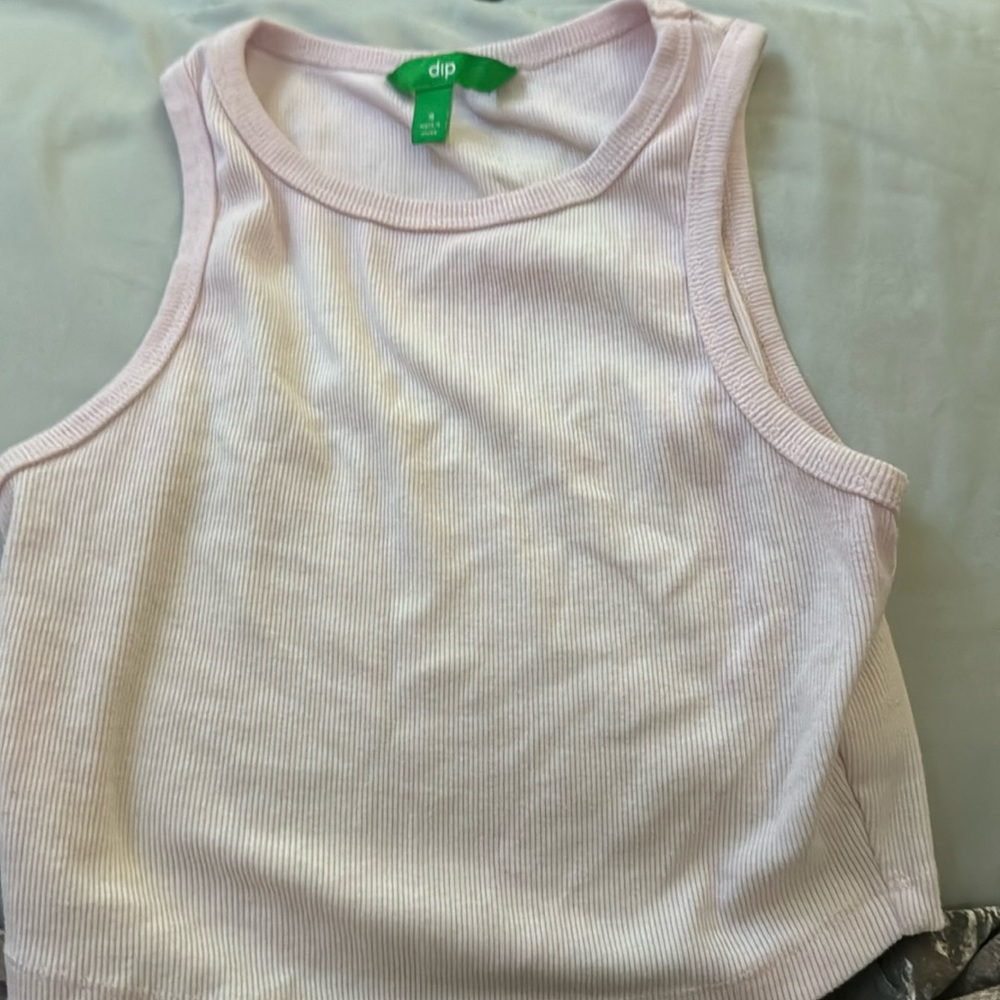 Baby pink tank top.